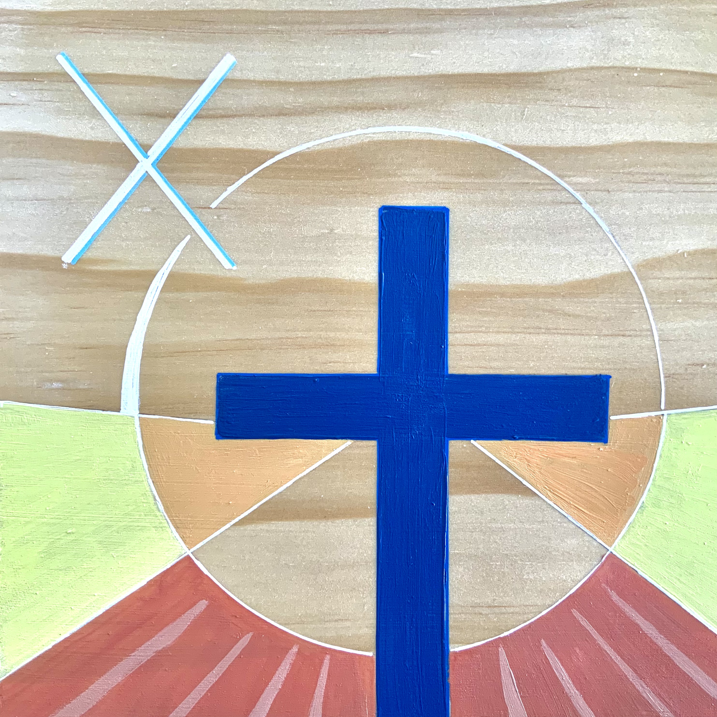 Illustrated mural of a blue cross within a circular design, with the Roman numeral “X” displayed beside it.